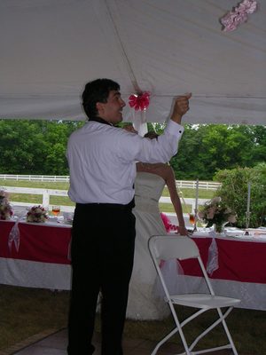 Amber's garter goes through the air.